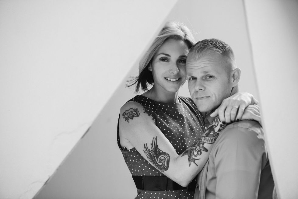 a woman has a tattoo on her arm that says " i love you "