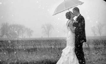 bride and groom in snow