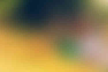 a man and a woman are looking at each other and smiling