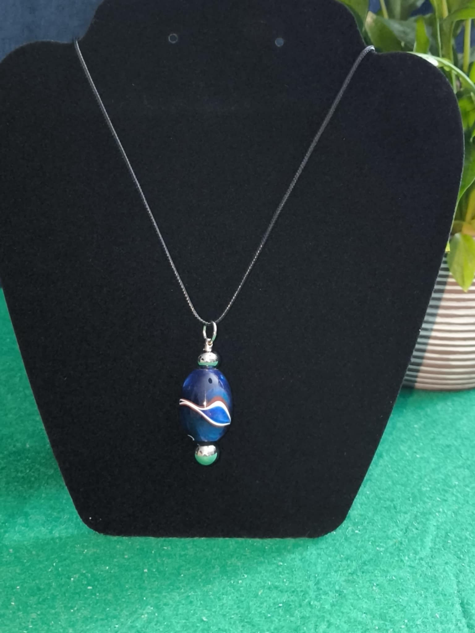 Handmade blue white and red kirinite pendant
