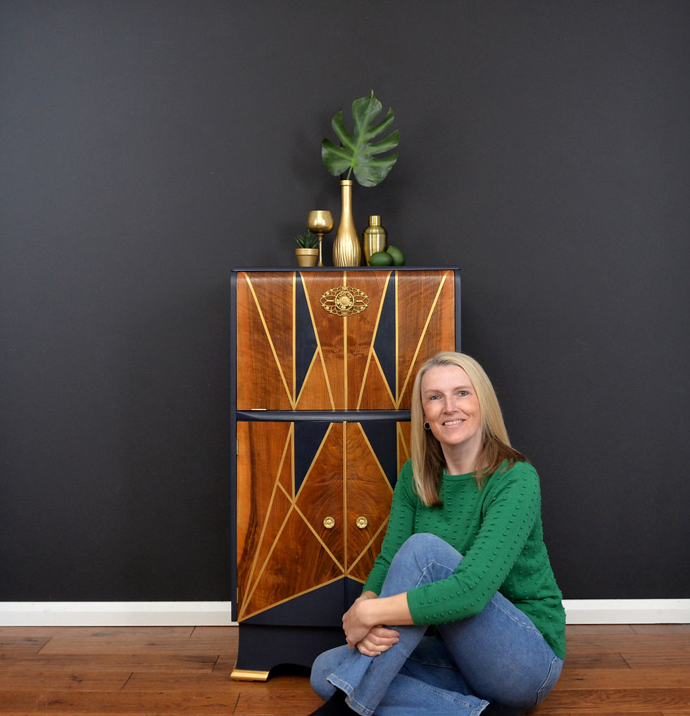 Navy and gold art deco cocktail cabinet with creator