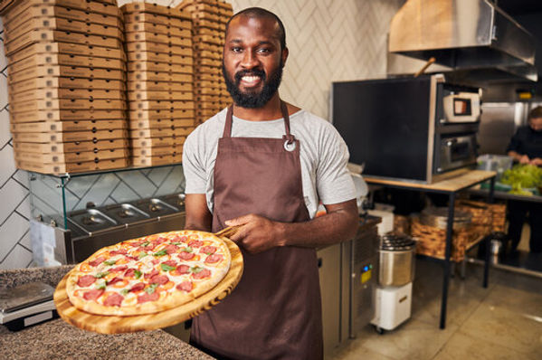 Black Guy Making pizza .jpg