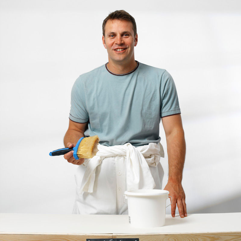Painter Holding Brush