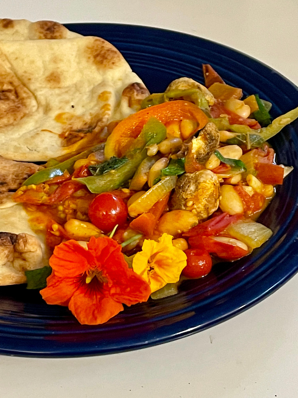 All of Life Is Creation, Photo of Homemade Curry with Edible Flowers