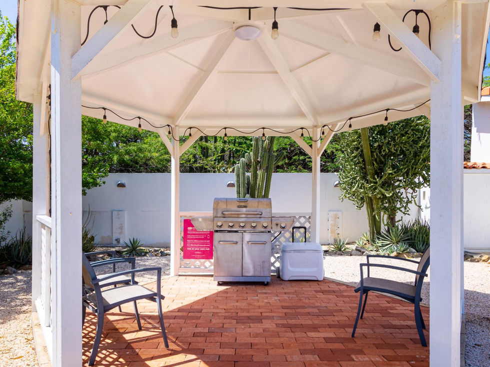 Outdoor gazebo with grill, seating