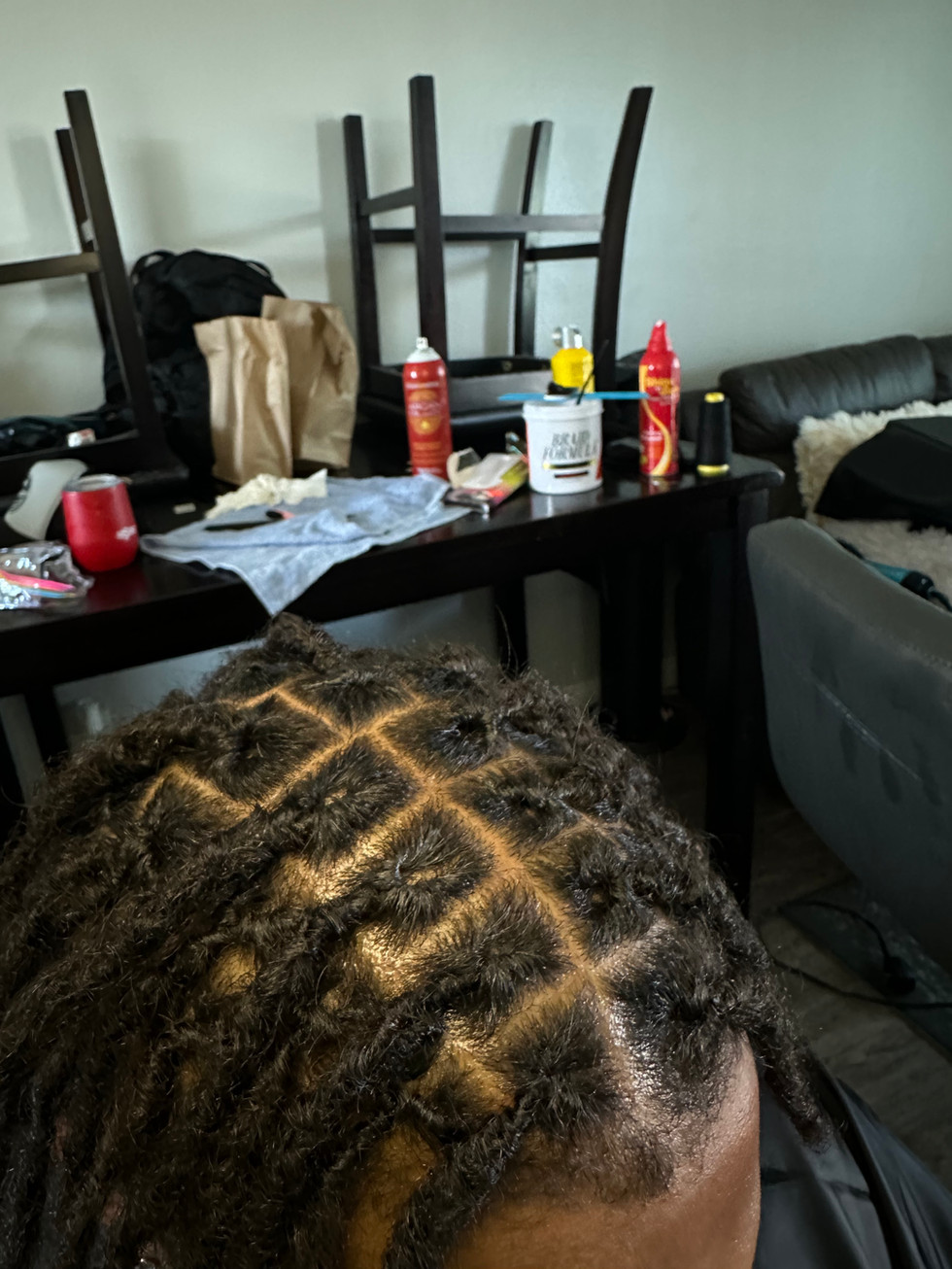Dreadlock Retwist at Angie Hairr Stylist in 811 S Fairview Street Santa Ana