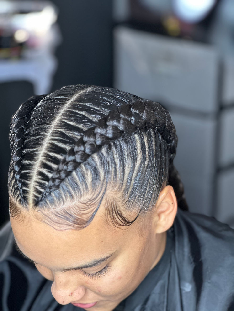 Two Cornrow Braids or Dutch Braids done at Angie Hairr Stylist in 811 S Fairview Street Santa Ana, Ca