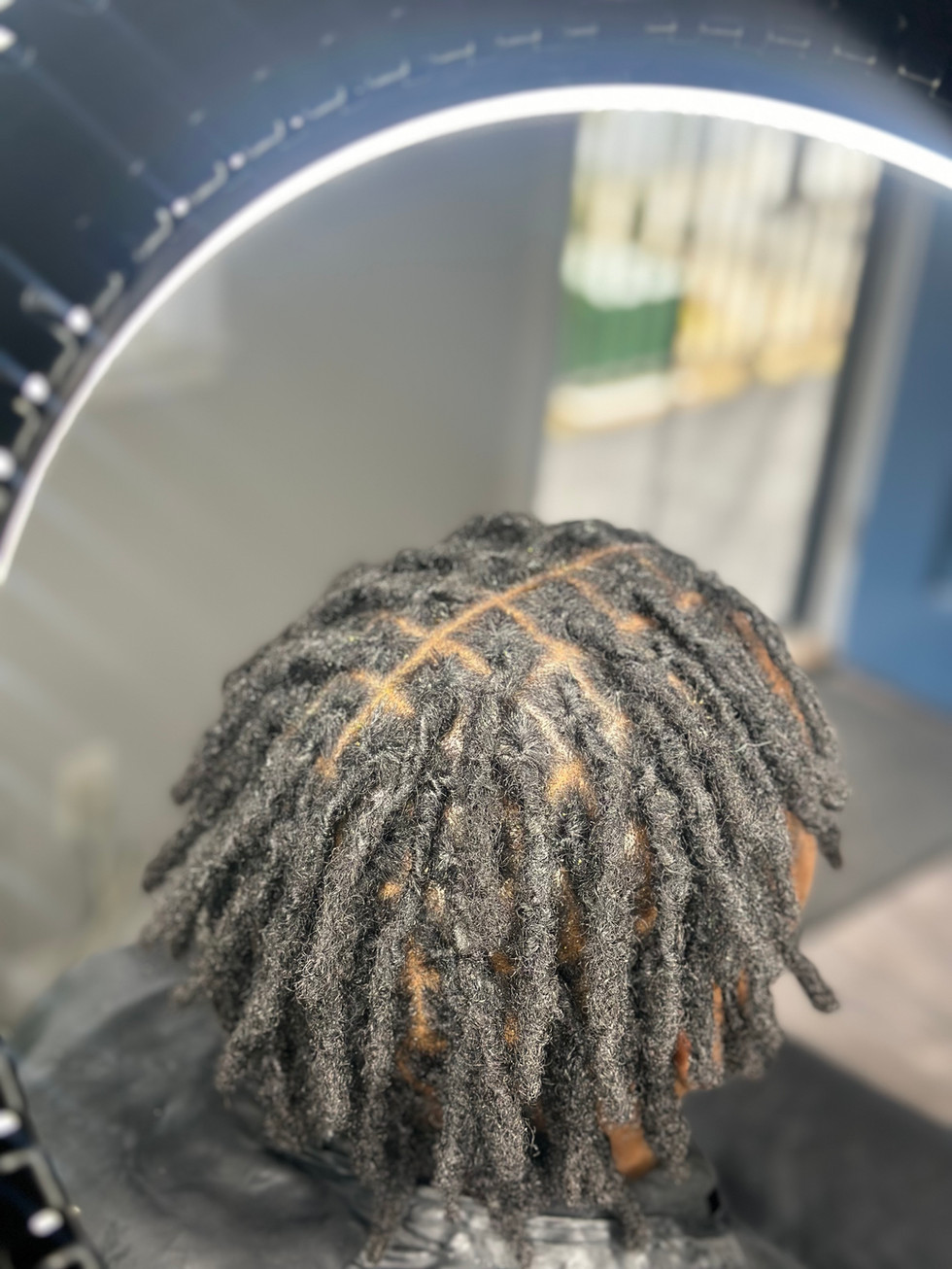 Dreadlock Retwist at Angie Hairr Stylist in 811 S Fairview Street Santa Ana