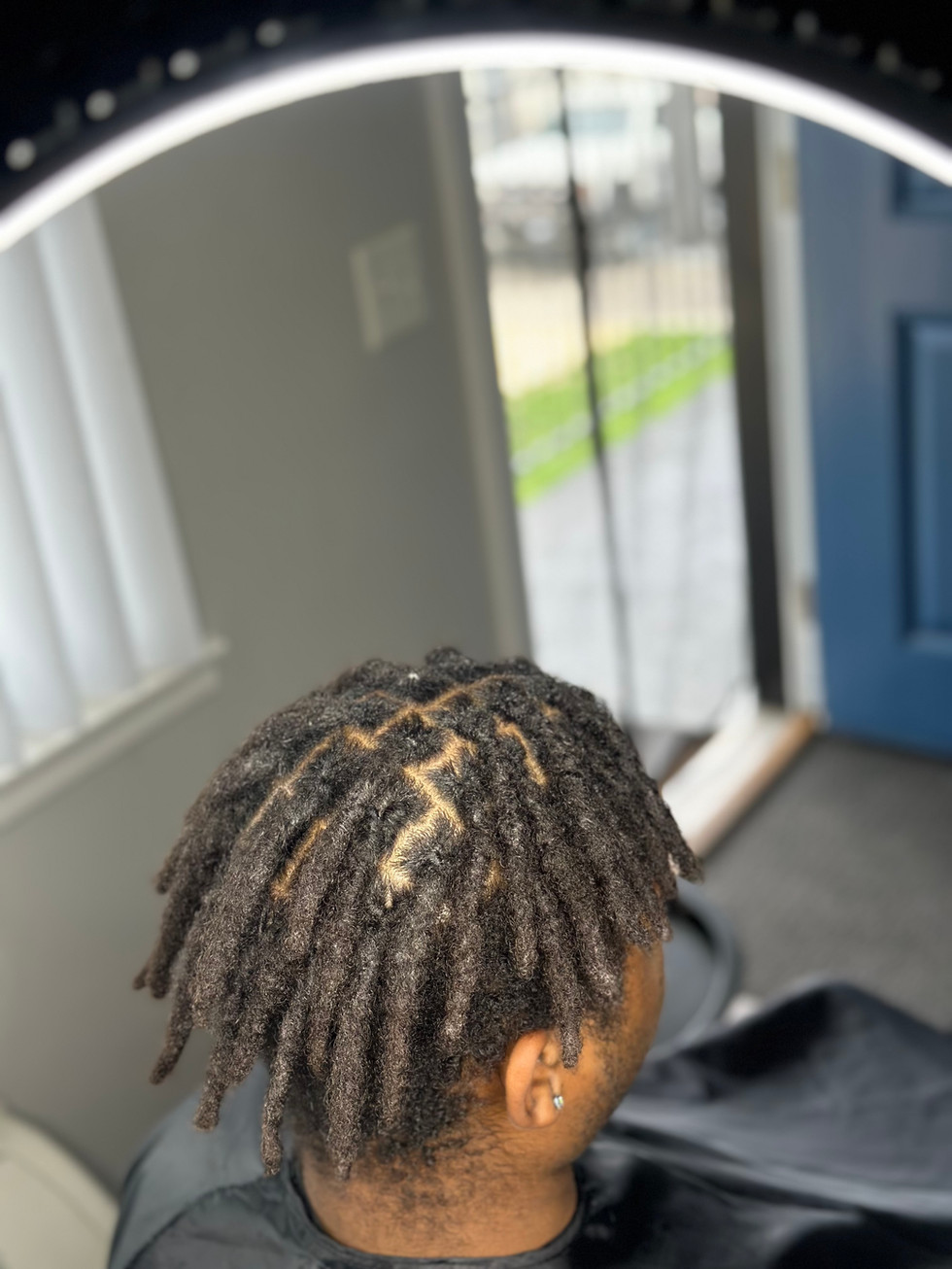 Dreadlock Retwist at Angie Hairr Stylist in 811 S Fairview Street Santa Ana