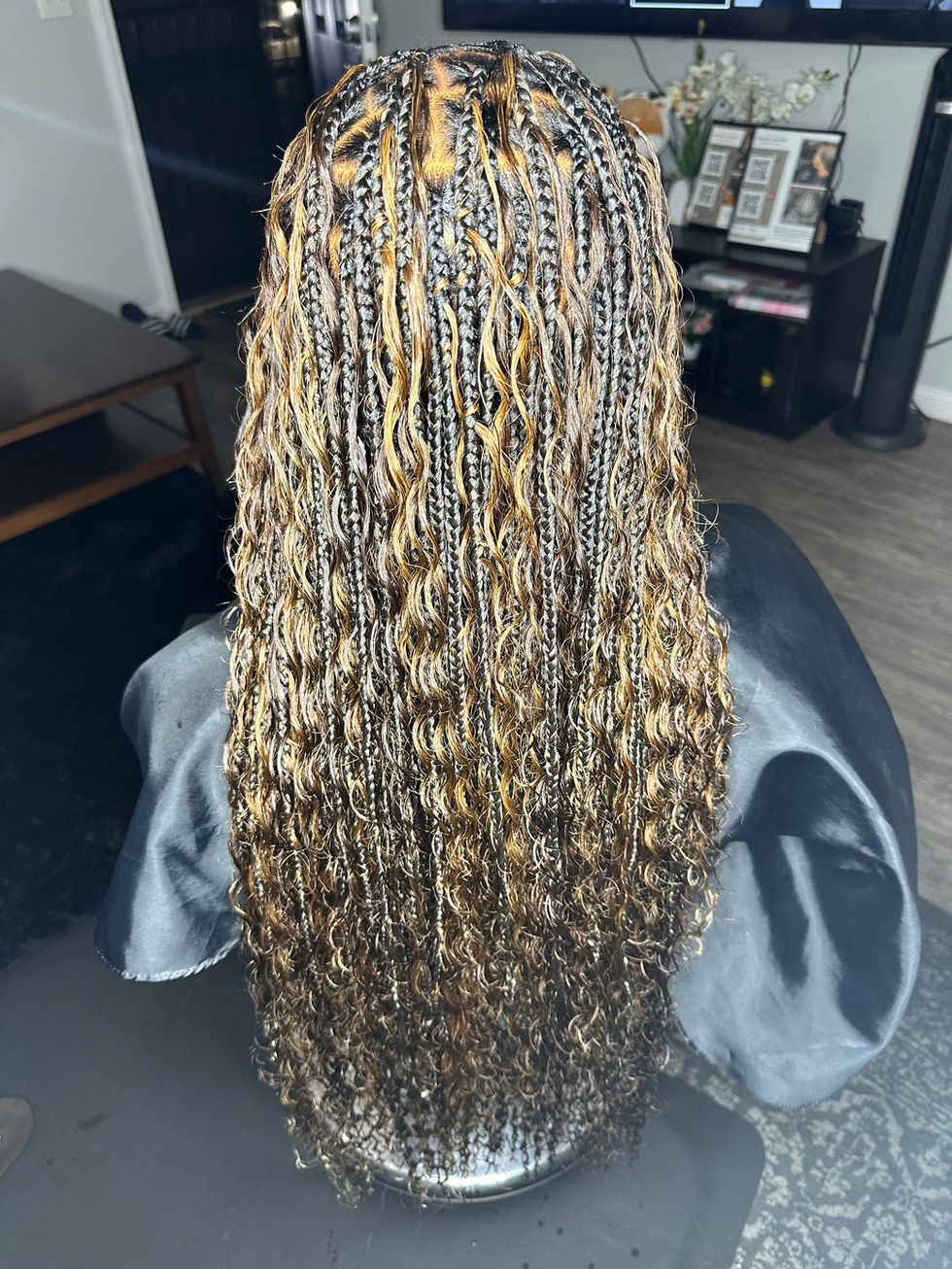 Knotless Goddess/Boho Braids done at Angie Hairr Stylist in 811 S Fairview Street Santa Ana, California