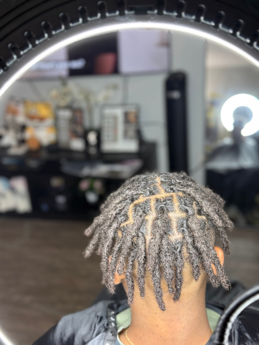 Dreadlock Retwist at Angie Hairr Stylist in 811 S Fairview Street Santa Ana
