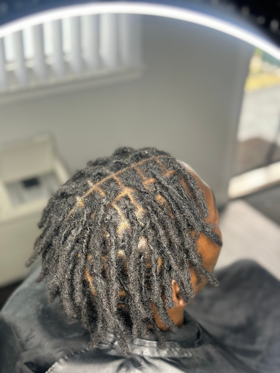 Dreadlock Retwist at Angie Hairr Stylist in 811 S Fairview Street Santa Ana