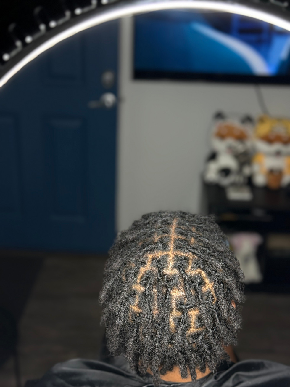 Dreadlock Retwist at Angie Hairr Stylist in 811 S Fairview Street Santa Ana