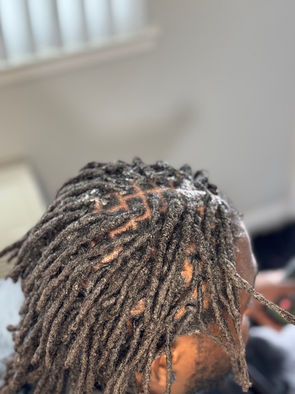 Dreadlock Retwist at Angie Hairr Stylist in 811 S Fairview Street Santa Ana