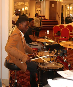 A picture of one of our talented members playing the drums