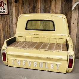 Handcrafted pickup-inspired bench featuring detailed taillights, classic truck styling, and a handcrafted wood seat. Built to order and available in the paint color of your choice, this unique bench is perfect for porches, patios, farmhouses, cabins, garages, and man caves.