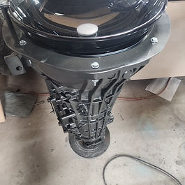 Handcrafted from a real automotive transmission, this unique sink features a smoked clear vessel bowl that showcases the transmission case below, a stainless steel faucet, and a durable gunmetal gray finish. Each sink is one of a kind and built from genuine transmission housings.