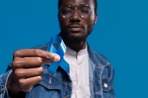 african-american-man-holding-blue-ribbon_23-2149132222.jpeg