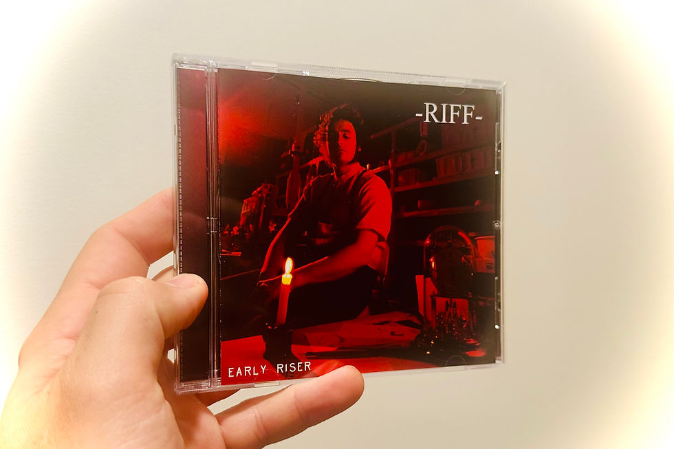 Close-up view of a CD case with album artwork