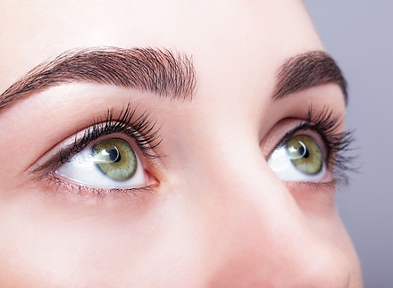 Closeup shot of female green pistachio colour eye with day makeup.jpg
