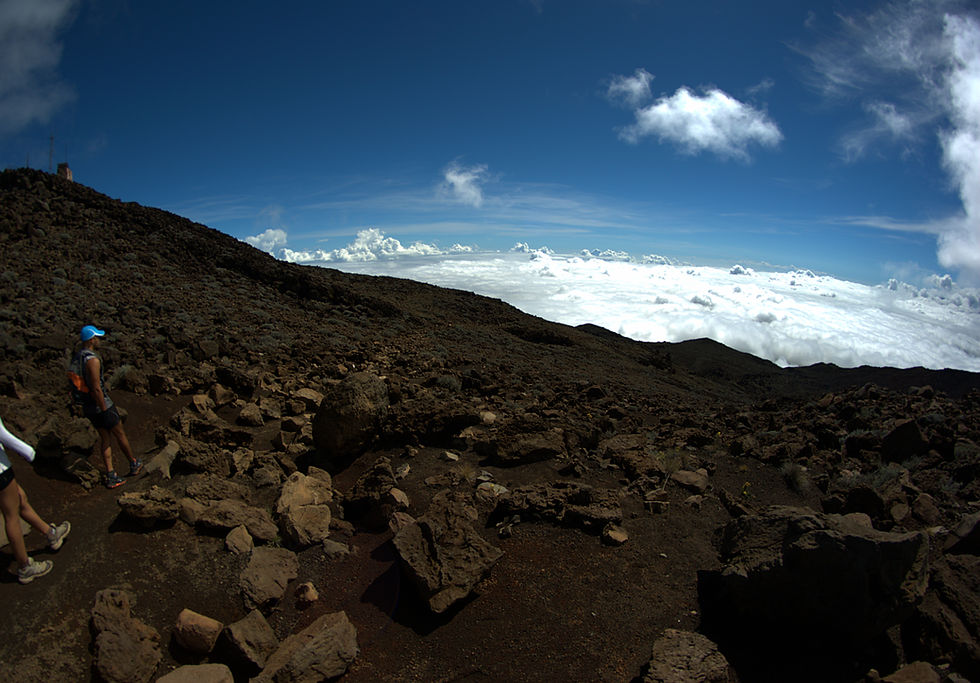 Sunrise over a sea of clouds at the summit of Piton des Neiges, Réunion