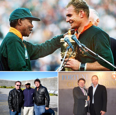 Springbok Captain Francois Pienaar receives the Rugby World Cup from President Nelson Mandela.