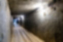 dark-extensive-stone-hall-of-an-abandoned-mine.jpg
