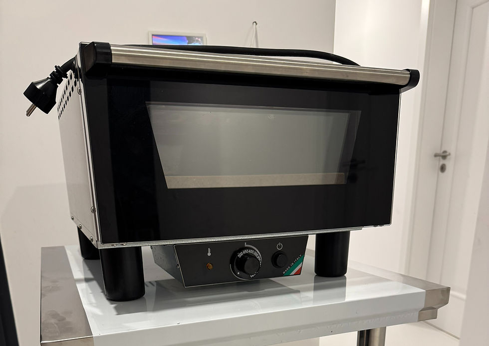 an electric N3 Pizzaoven on a kitchen cart
