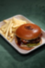 Wagyu Beef Burger with Gruyere Cheese, BBQ & Truffle Mushrooms Sauces,Pickles & French Frise