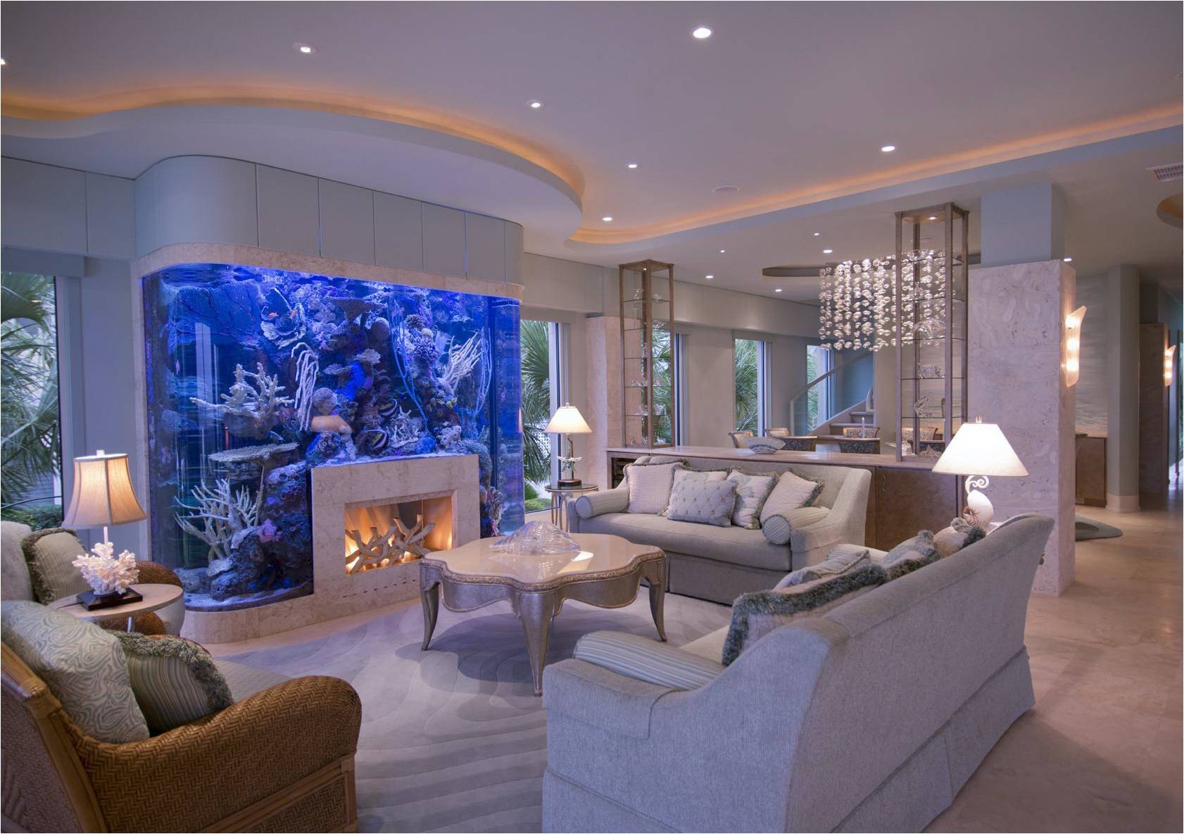 Huge saltwater aquarium surrounds a fireplace in Wrightsville Beach, NC