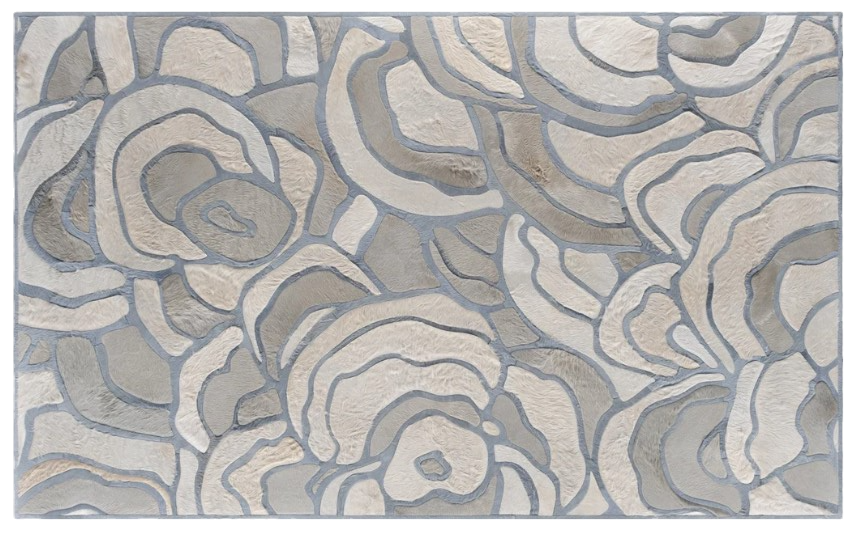 : Artistic hide rug featuring a colorful floral design with shades of pink, blue, and green, crafted from high-quality leather for a unique and stylish look.