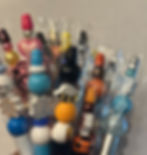 Pens with colorful beads on them.