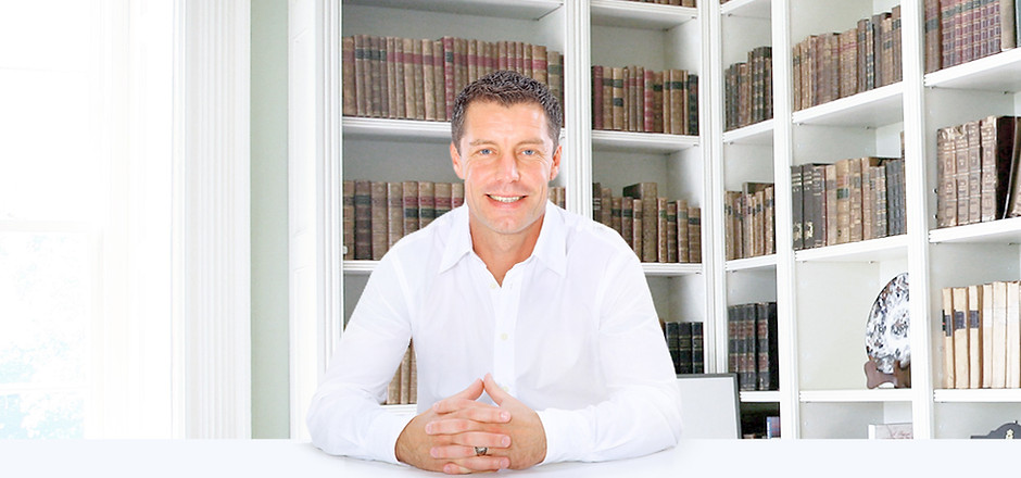 Man Sitting in Library
