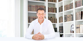 Man Sitting in Library