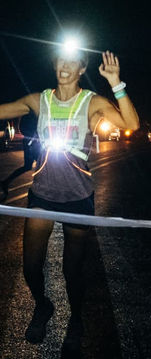 Crossing a make shift finish line under the night sky — one of many stretches of Oregon’s iconic Hood to Coast Relay, celebrating endurance, teamwork, and pure grit.