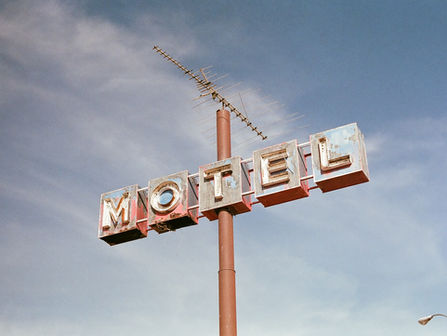 motel sign on a pole