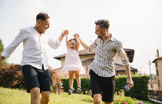 Gay Couple with their Daughter.jpg.webp