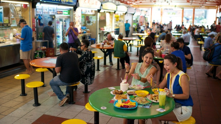 Enjoy delicious local food at a hawker centre in Singapore