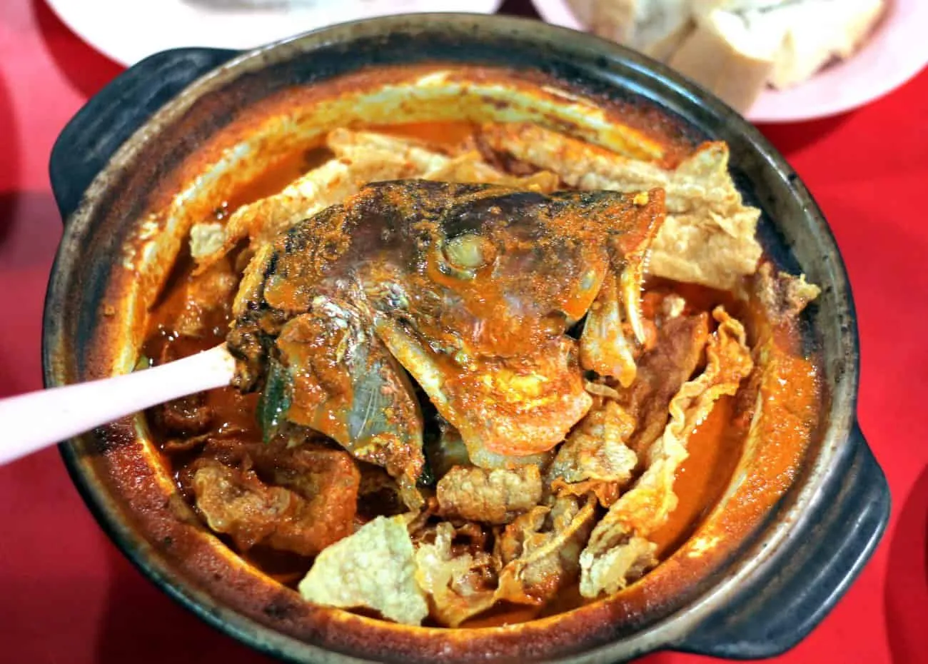 Brightly coloured Fish Head Curry from NaNa Curry 