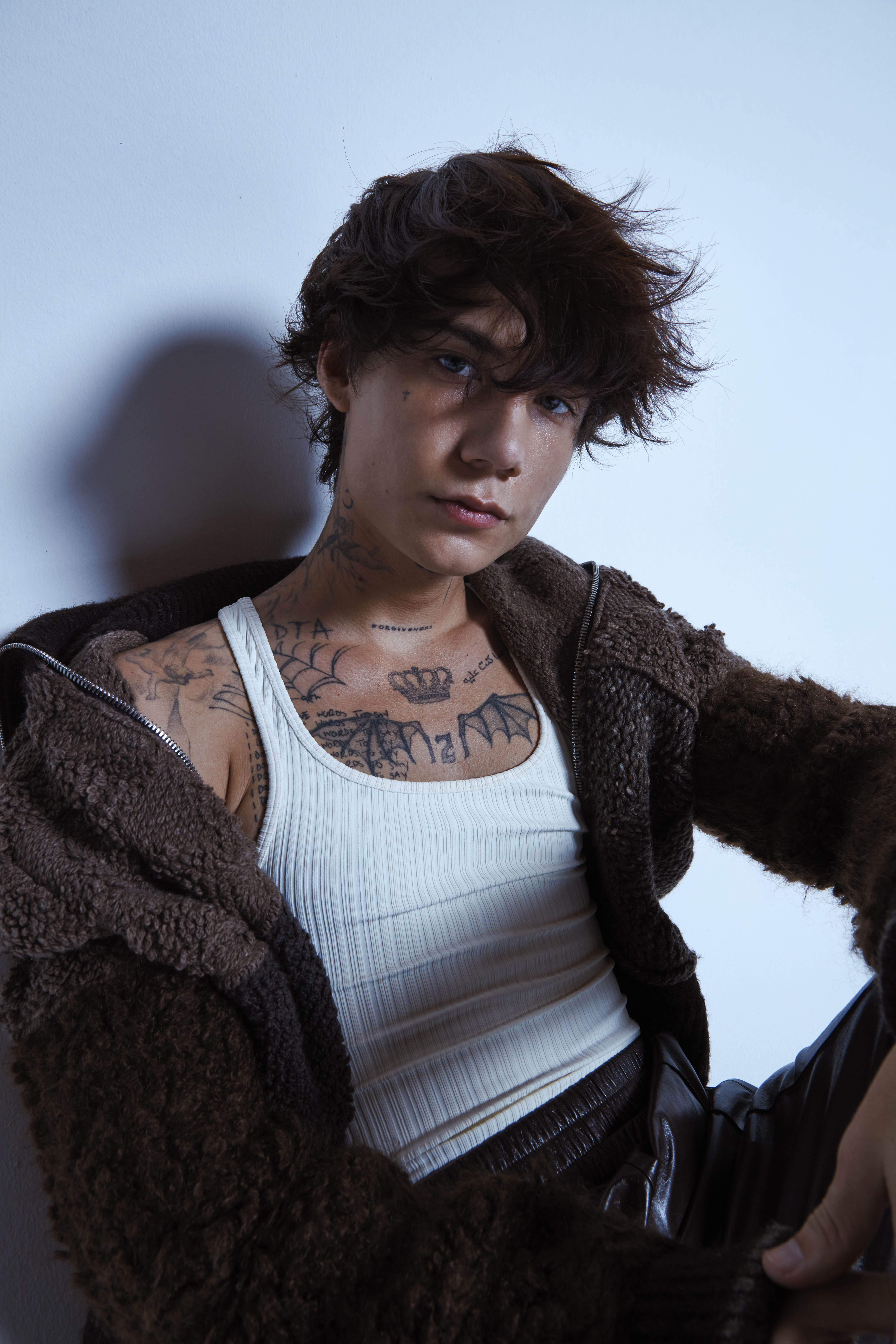 An aerial view of a field. A road runs through the upper right corner.