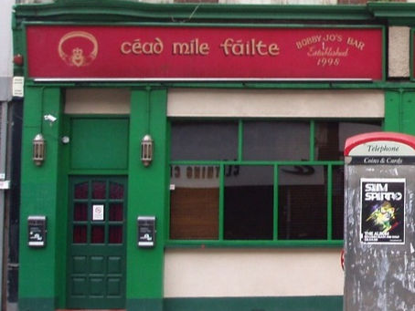 Photo of a sign saying Céad Míle Fáilte, outside The Kingsland pub in Dalston, London E8 