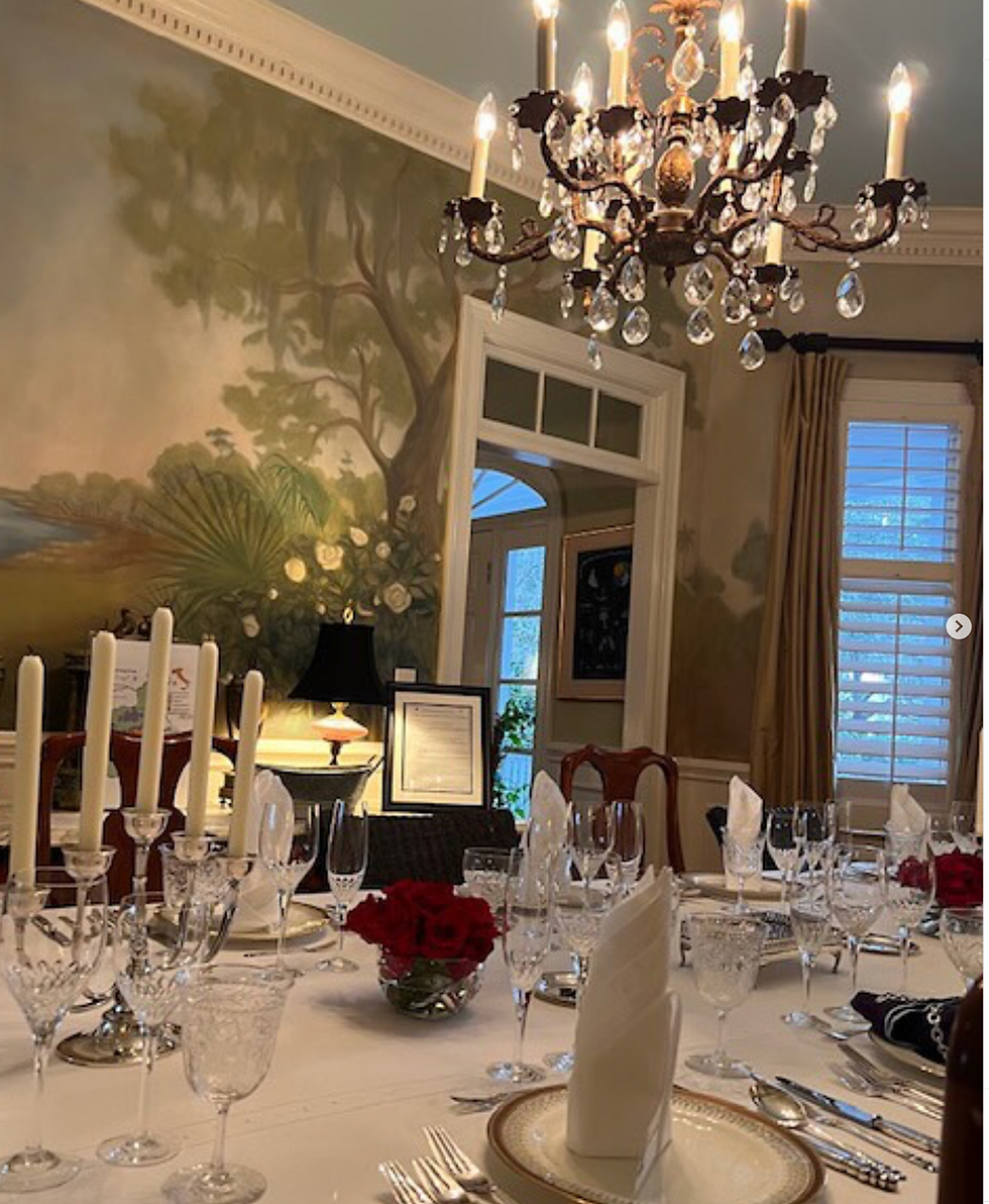 Dining table set for dinner
