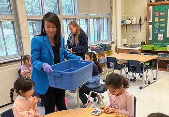 Lily Cheng helping students at Lillian Public School