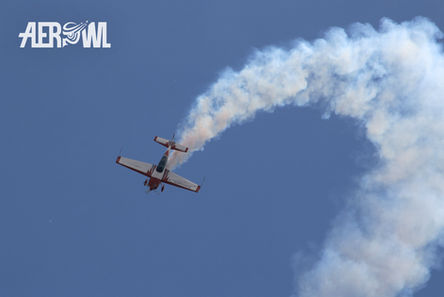 <p class="font_8">Pilot Uwe Wendt start diving after a high climb over the BER airport during the ILA 2014 in Berlin/Brandenburg, Germany.</p>