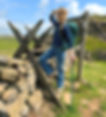 Hiker looking out over Hadrian's Wall on a guided tour
