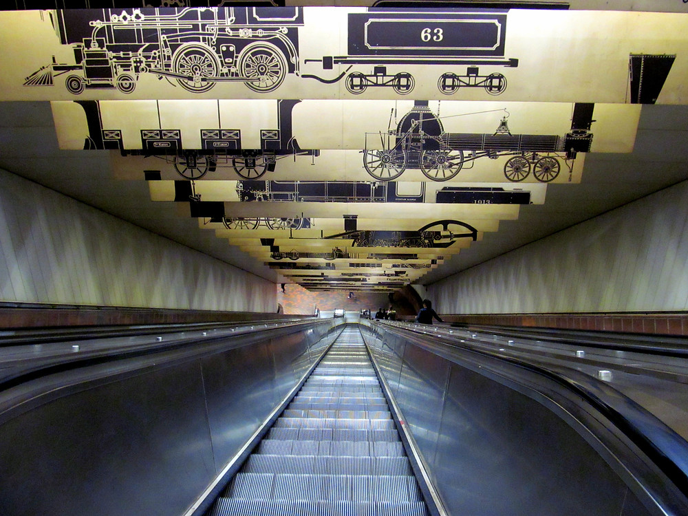 Escalator going down to Porter Square T