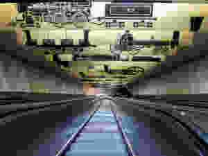 Escalator going down to Porter Square T