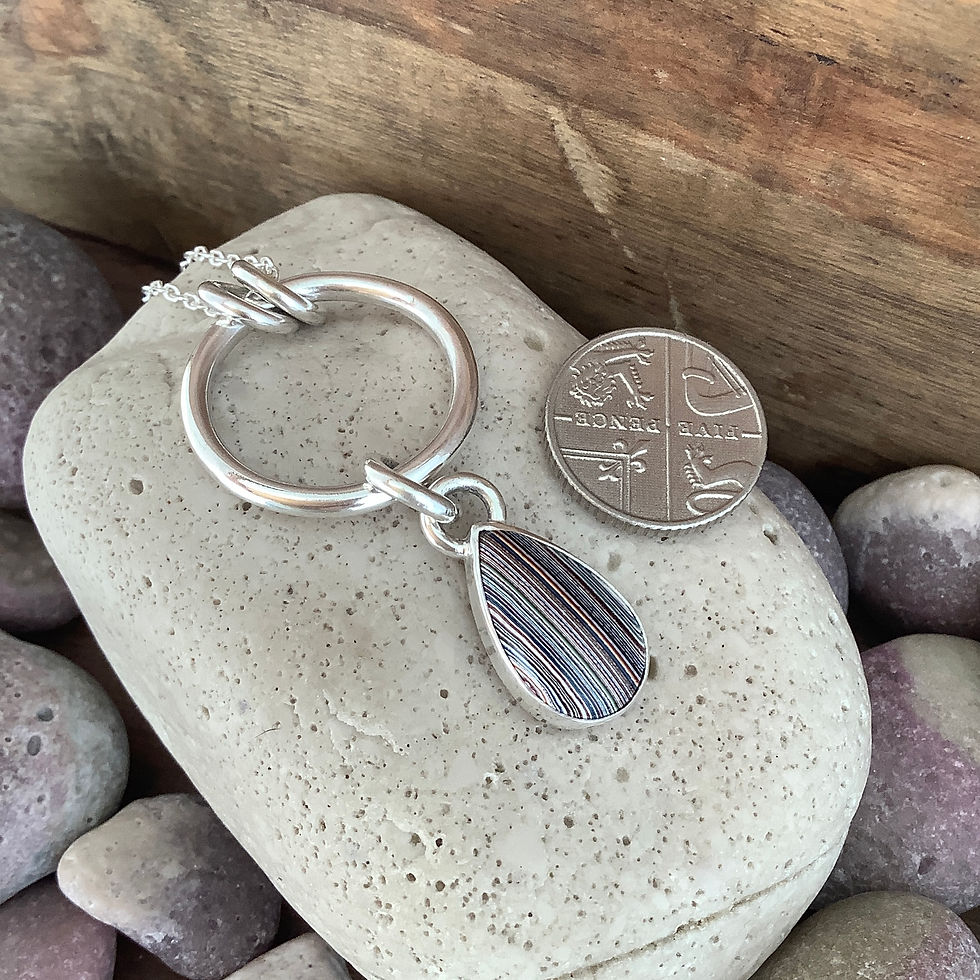 Thumbnail: Handmade Fordite and Sterling Silver Pendant 