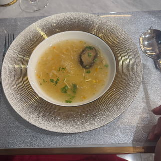 Abalone soup with snowy mushroom and asparagus