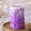 Thumbnail: Purple floral carved candle on golden tray, unique birthday gift for women.